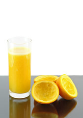 Glass of fresh orange juice . Isolated