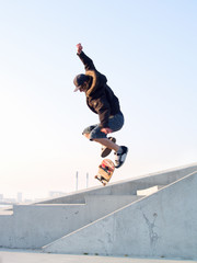 Modern teenage skater catching some air © FreedomImage