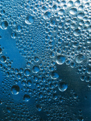 Abstract background. Liquid on dirty glass