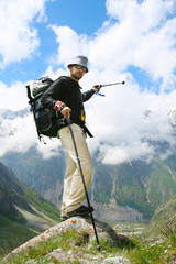 Hiker in Caucasus mountains
