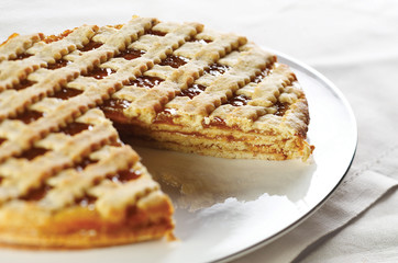 Marmelade cake on white plate