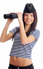 Sexy girl in marine uniform holding binocular
