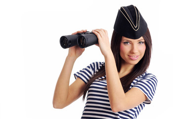 Sexy girl in marine uniform holding binocular
