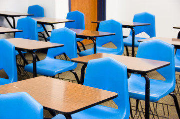 Empty desks in a classroom