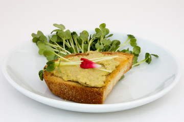 Fresh Pea Hummus Crostini with Pea Tendril Garnish