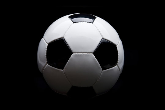 Football in black background