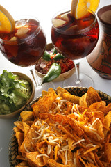 Sangria, corn chips and guacamole