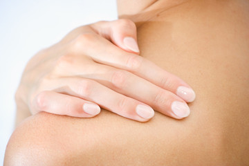 female hand on shoulder