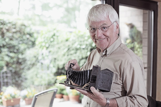 Old Man With An Old Camera