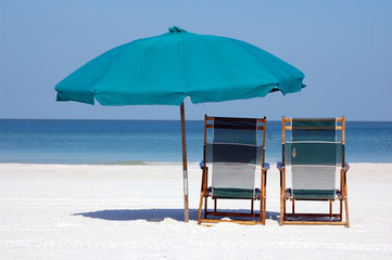 Beach umbrella / chairs