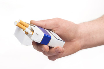 packet of cigarette in man's hand