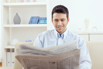 Man reading newspaper