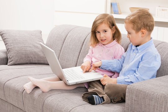 Siblings browsing internet