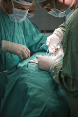 Surgeons at work in operating room