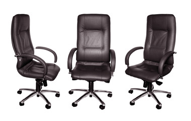 Some black leather armchairs in different foreshortening