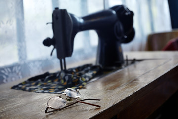 Glasses and sewing machine