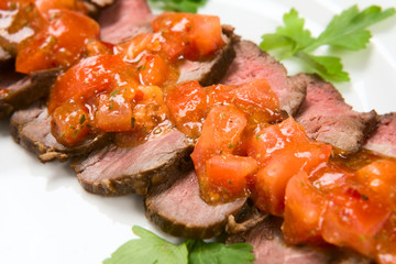 barbecue with sauce and vegetables