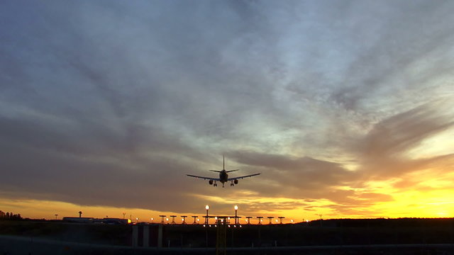 Aircraft  landing at dusk