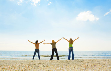 friends having fun on the beach
