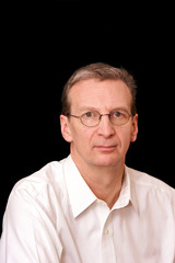 Obraz premium portrait of mature man against a black background