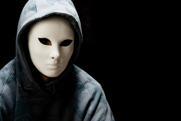 man wearing white mask and hood