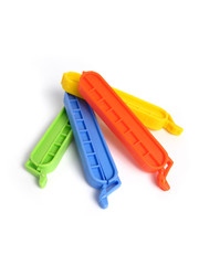Clips for food Bags in various colors on white background