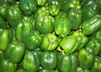 Plakat group of green paprika bell peppers in market