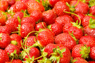 Lots of strawberries arranged as the background