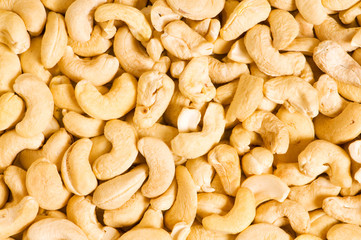 Cashew nuts arranged at the background