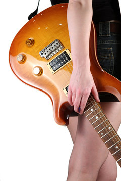 Cute girl with electric guitar isolated