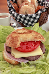 Early cranking with a croissant, deli meats and swiss cheese