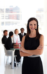 Young Confident business woman with a headset on