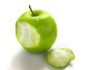 green apple with a bite taken out, from above