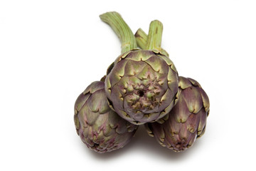 Fototapeta premium Artichokes isolated on a white studio background.