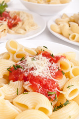 servings of pasta with tomato sauce