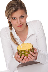 Healthy lifestyle series - Blond woman holding pineapple