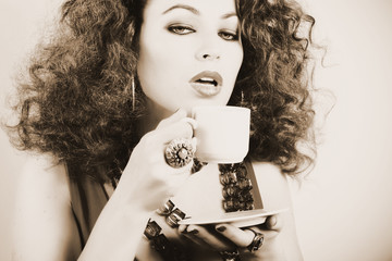 Beautiful woman drinking coffee - 13886209