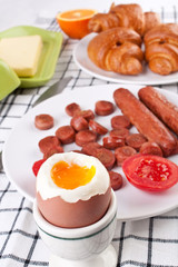 breakfast meal - soft-boiled egg with sausages