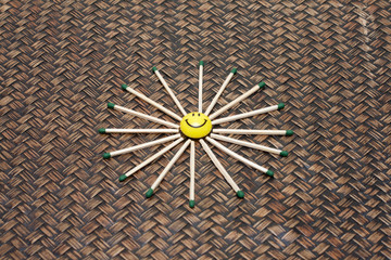Yellow smile on bamboo background