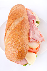 white wheat baguette sandwich on plate
