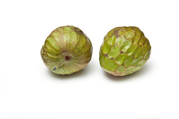 Obraz premium Custard apple fruit isolated on a white studio background.