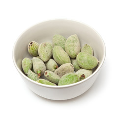 Bowl of fresh green almonds