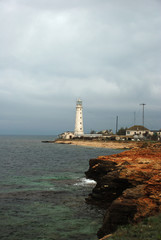 Fototapeta na wymiar lighthouse over sea storm