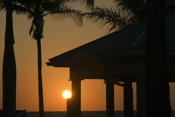 Sunrise at a beach pavillion
