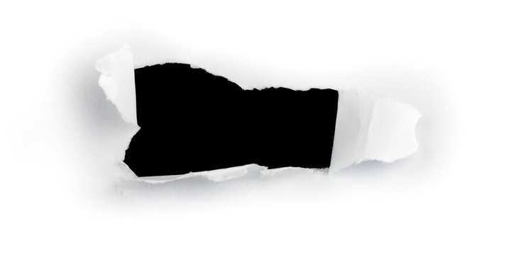 image d'un trou dans une feuille de papier pour message