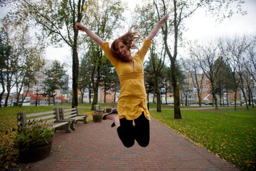 Happy Girl Jumping for Joy