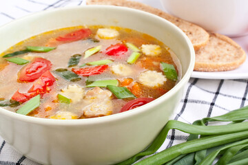 one serving of chicken and vegetable soup