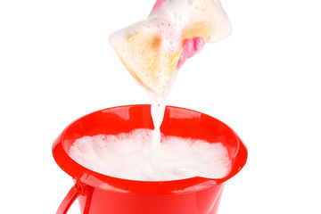 Household sponge in a hand