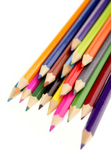 Colored pencils on white background