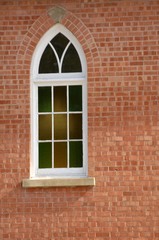 A stained glass window of a church